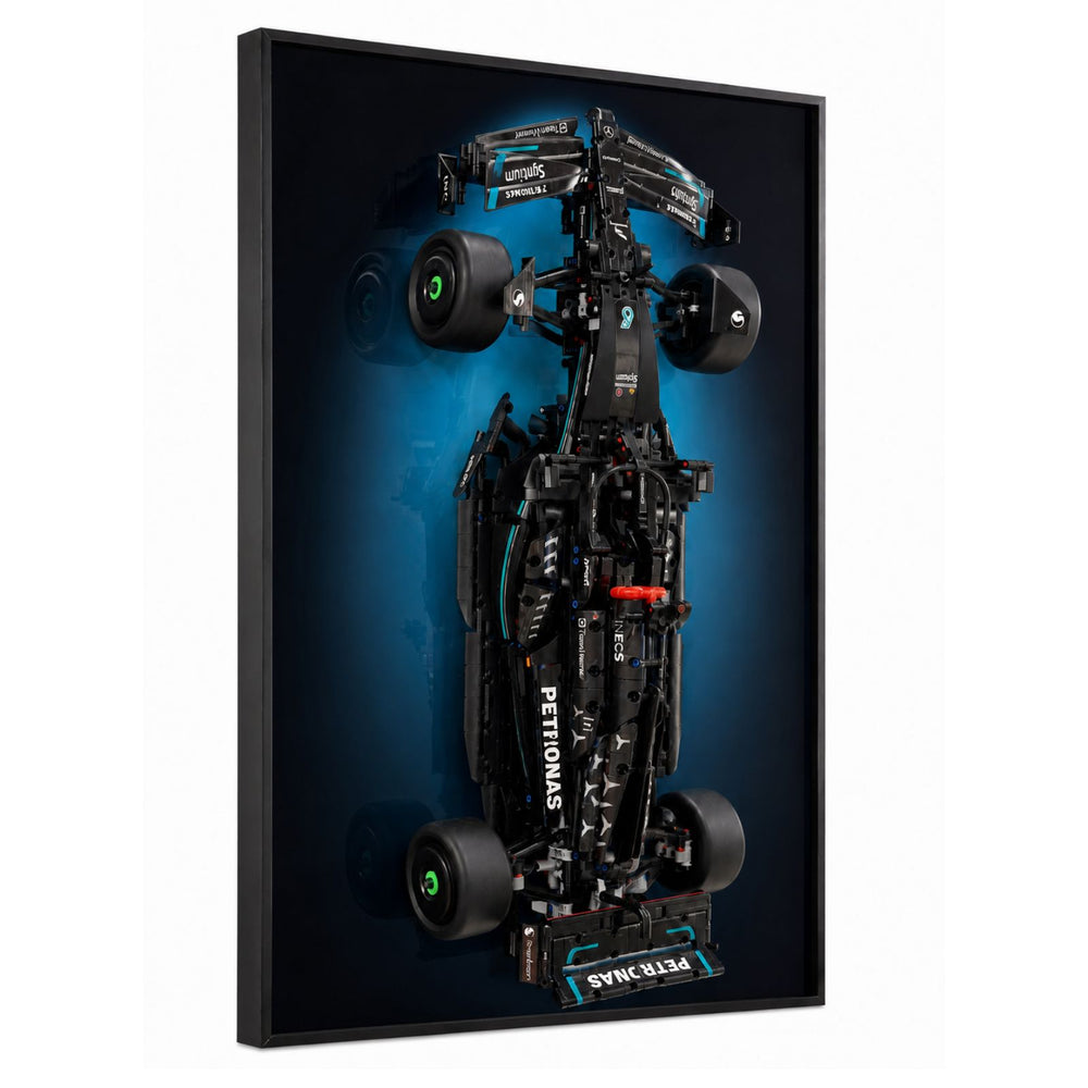 ONE MAAY Halo wall display frame for LEGO Technic 42171 Mercedes-AMG F1 W14 E — top-down view of black Formula 1 race car model on dark green framed panel
