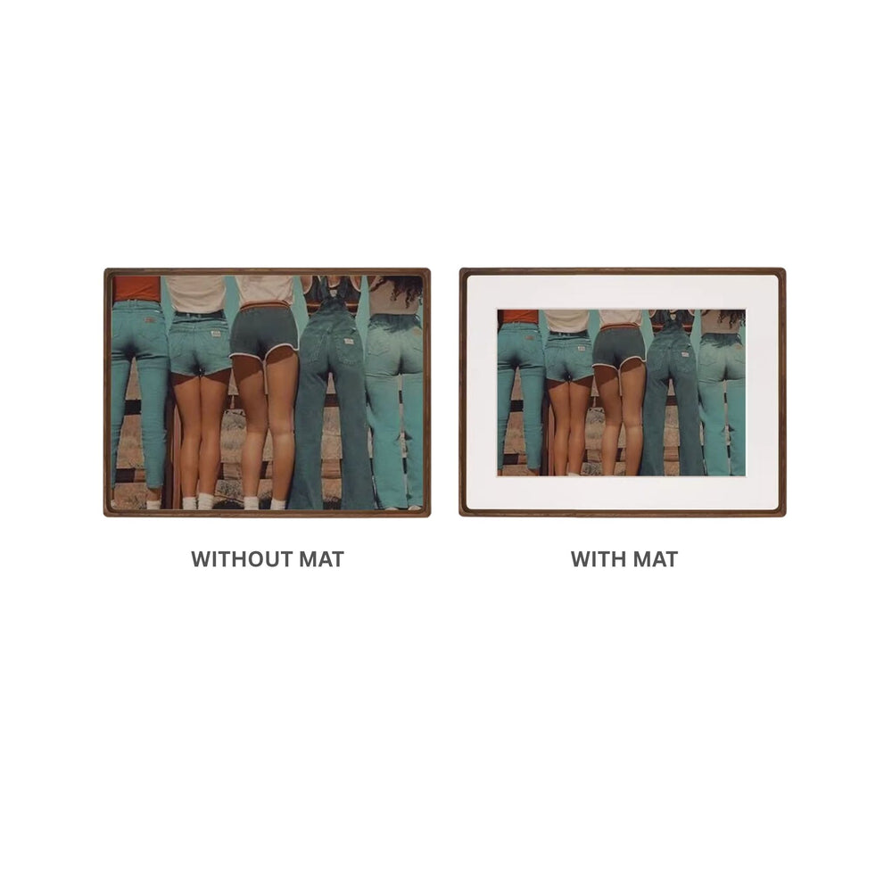 Two black walnut framed pictures side by side, one without a mat and one with a mat, on a white background.