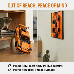 Orange toy car LEGO 42056 on a wooden floor with a cat looking at it, and another car displayed on a ONE MAAY wall frame. Text 'Out of Reach, Peace of Mind' and product features.
