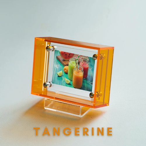 Transparent orange photo frame with a display of smoothies on a white background, featuring the word 'Tangerine'.