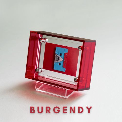 Red transparent frame with a blue cassette tape inside, on a white background with 'Burgundy' text.