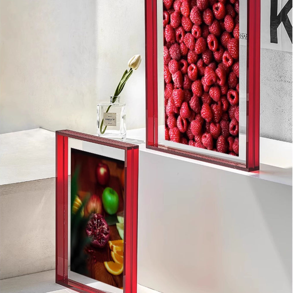 Two burgundy red picture frames on a light gray background