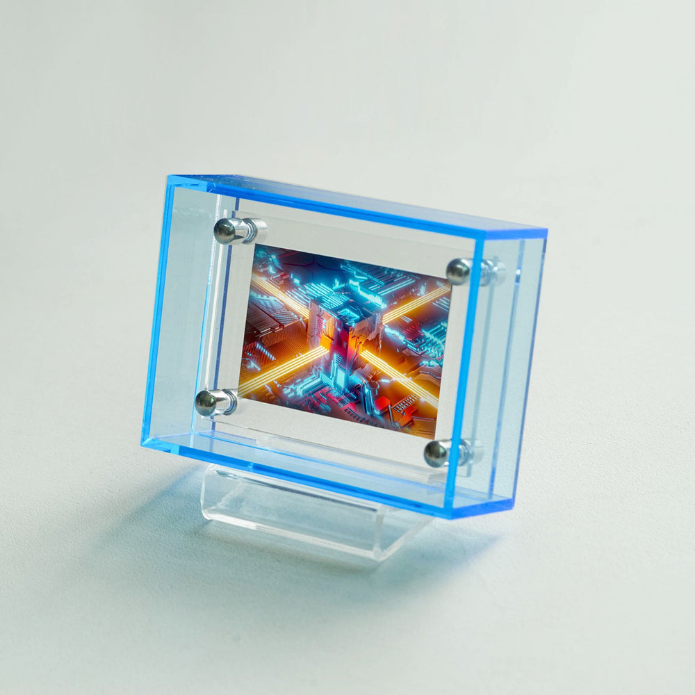 Small sky blue picture frame display with colorful abstract design inside a transparent blue frame on a light gray background