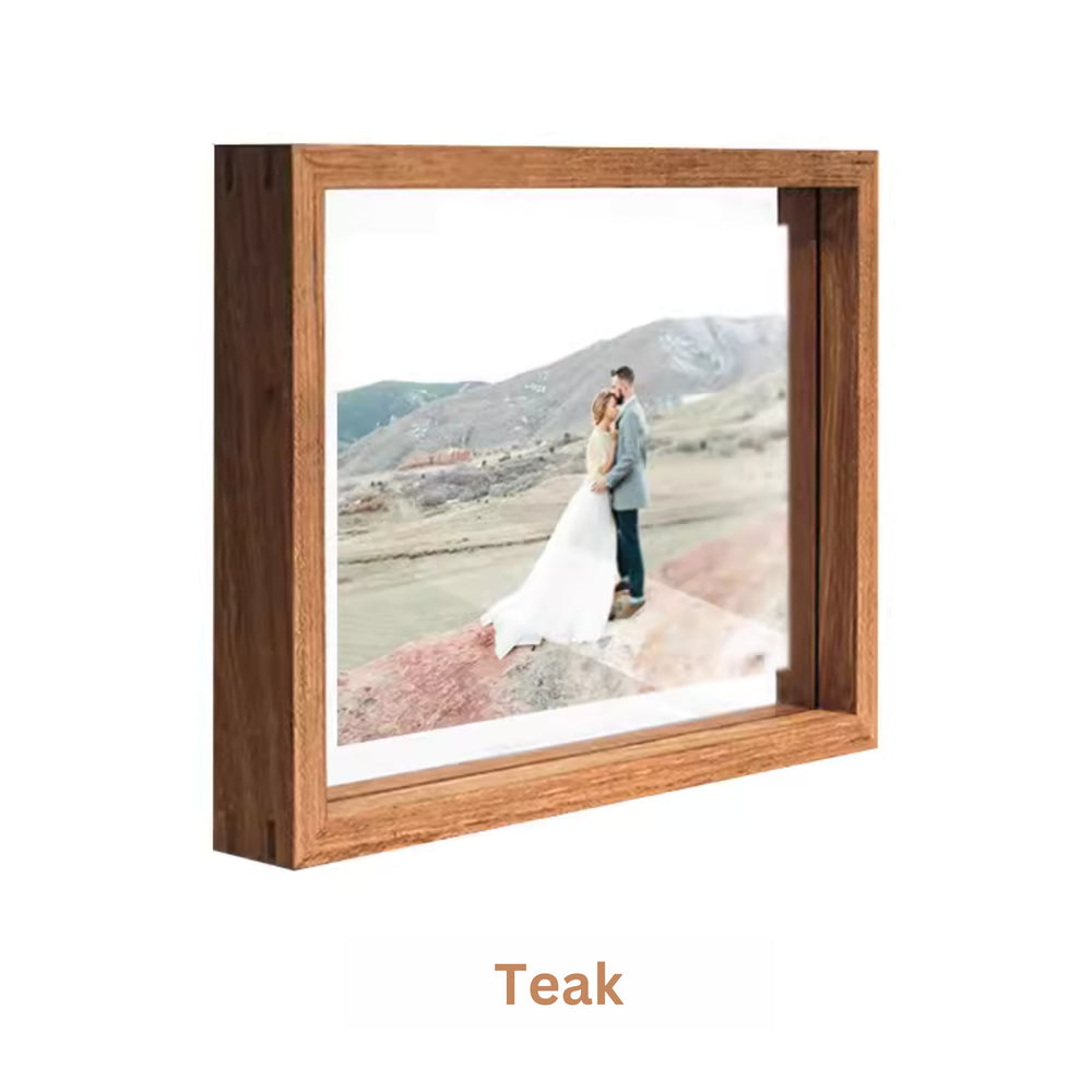 Teak wood photo frame with a scenic picture of a couple on a mountain, labeled 'Teak'. White background. 