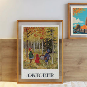 Teak wood transparent framed artwork of children in a forest with 'Oktober' text, displayed on a wooden surface.