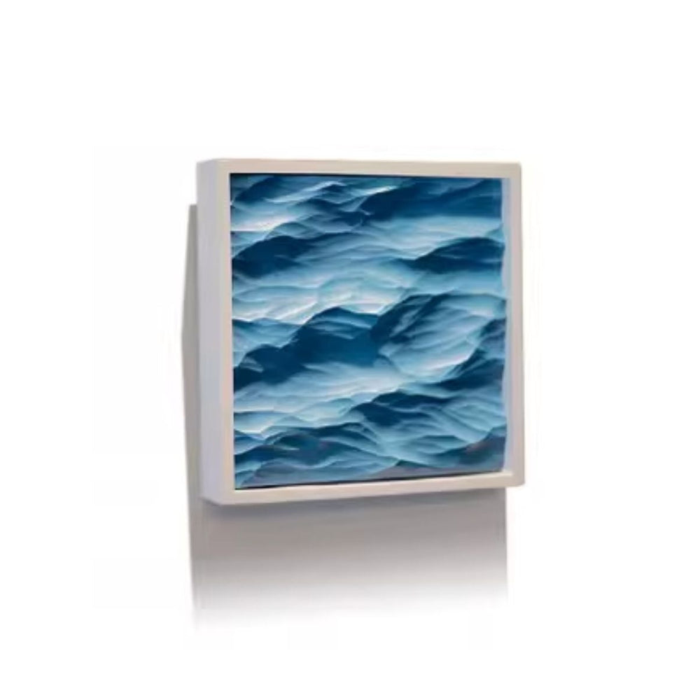 Thin white framed artwork on a blue wave pattern on a white background