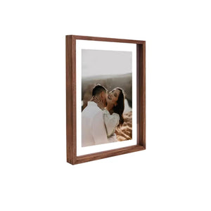 Black Walnut wood photo frame with a couple embracing on a beach