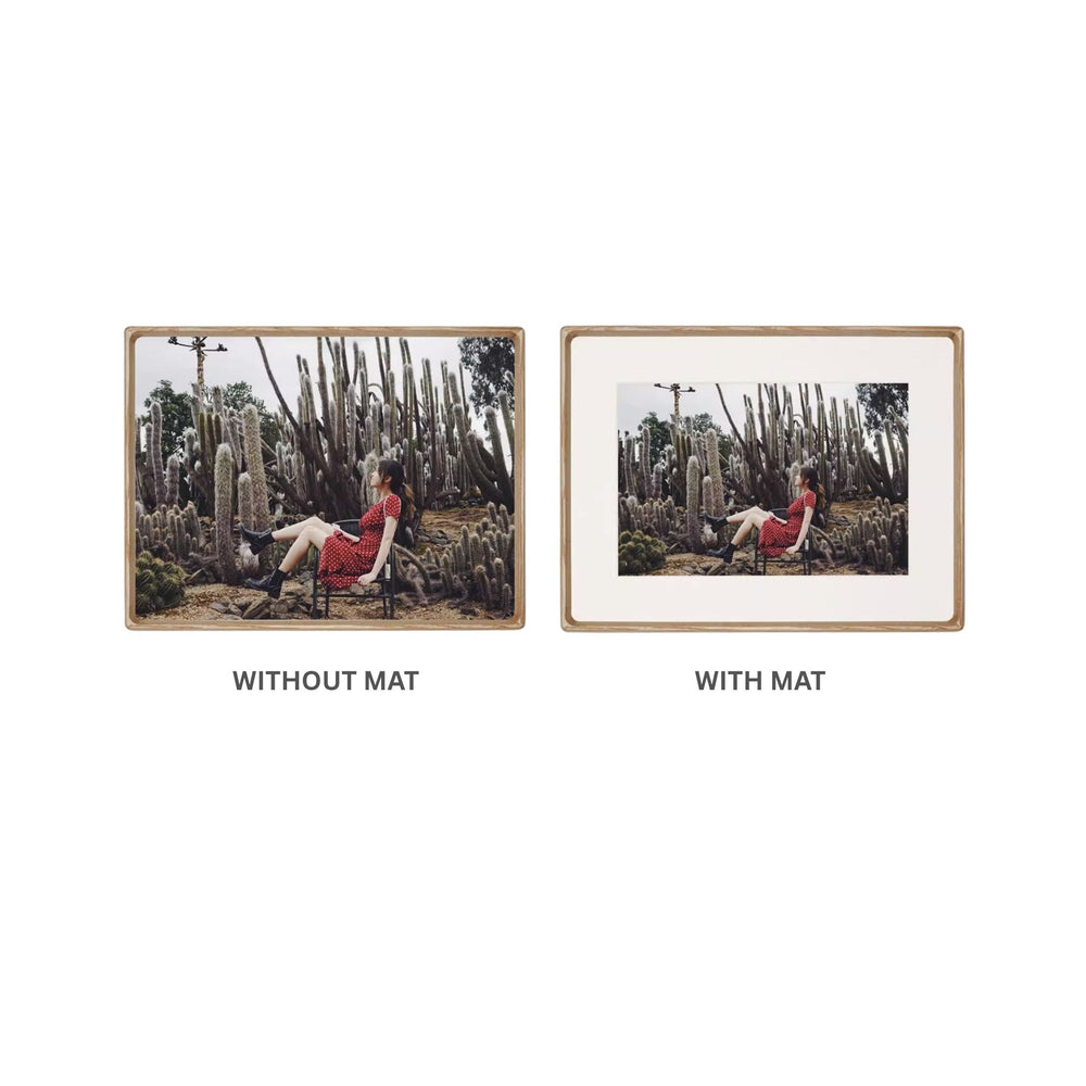 Two white ash wood framed pictures side by side, one without a mat and one with a mat, on a white background.