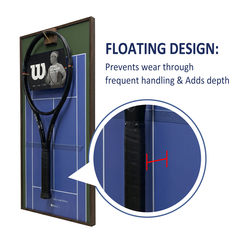 Close-up showing the floating design of the ONE MAAY tennis racket display, highlighting how the racket hovers over the blue hard court background to prevent wall damage