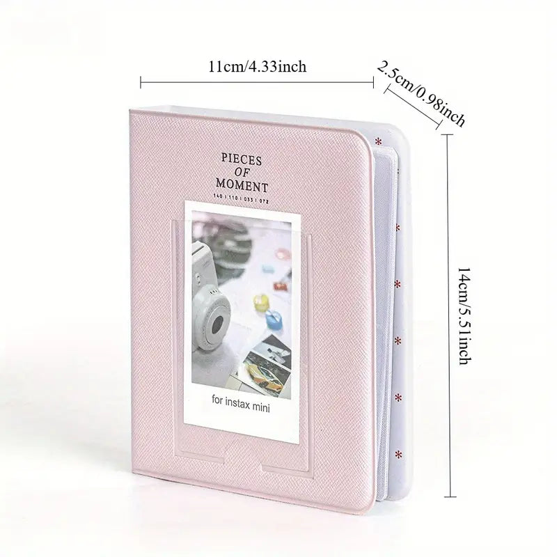Mint green photo album for Instax mini with a small window displaying photos on a white background
