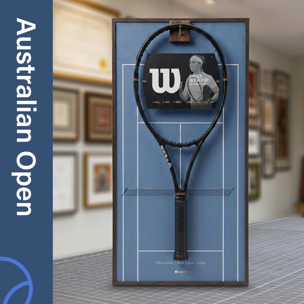 Front view of the ONE MAAY Australian Open-inspired tennis racket wall display, featuring a dark wood colored aluminum frame and a signature Melbourne blue hard court background holding a black tennis racket