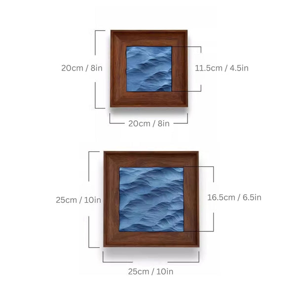 Two wooden-framed blue artworks with dimensions labeled on a white background