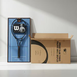The Australian Open-themed ONE MAAY tennis racket wall display leaning against a white wall next to its open Grand Slam shipping box